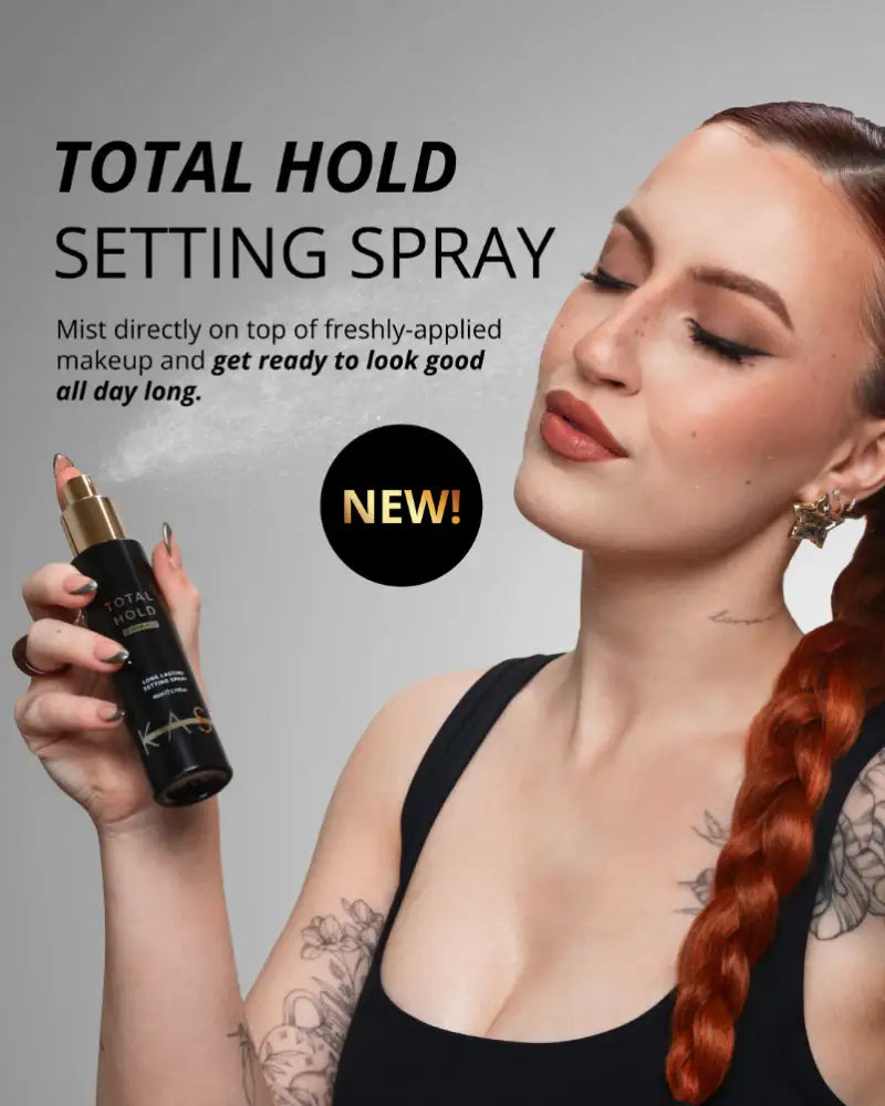 Woman spraying makeup setting spray on face, holding Total Hold bottle, flawless makeup look