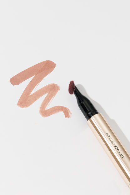 Lip liner with color swatch on a white background