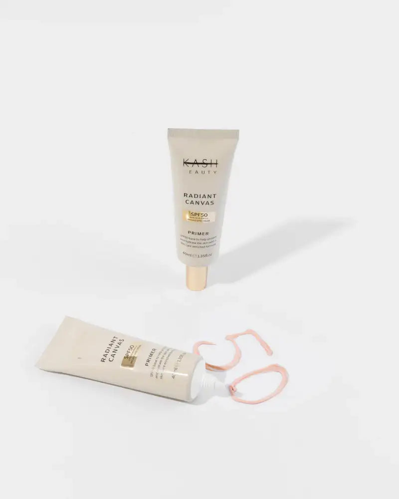 Radiant Canvas primer with SPF 50 in beige tubes, one standing, one open with product swatch