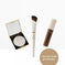 Pressed powder compact, makeup brush, and liquid concealer tube on white background, beauty products