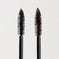Two mascara wands with black and brown product on white background
