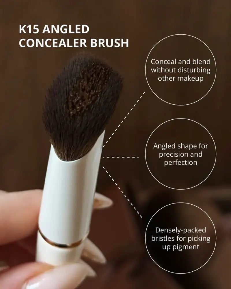 K15 angled concealer brush with dense bristles and white handle for makeup application