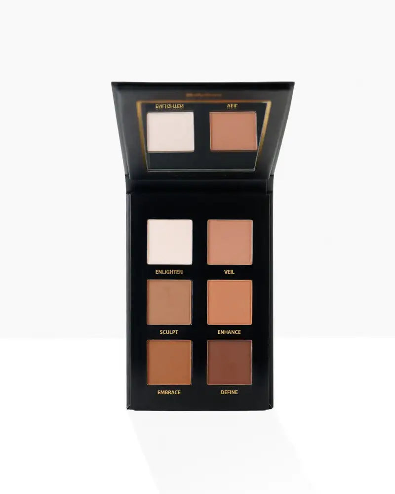 Makeup palette with various shades of brown and beige on a white background